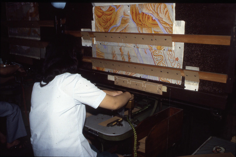 A worker punching cards for weaving in a Jacquard loom in China in 1984